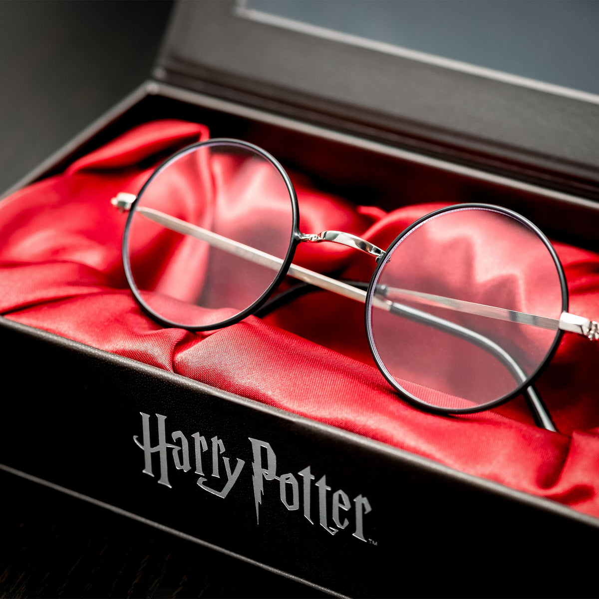 Celebrities with glasses wearing iconic eyewear styles including Aviators, oversized frames, and designer eyeglasses