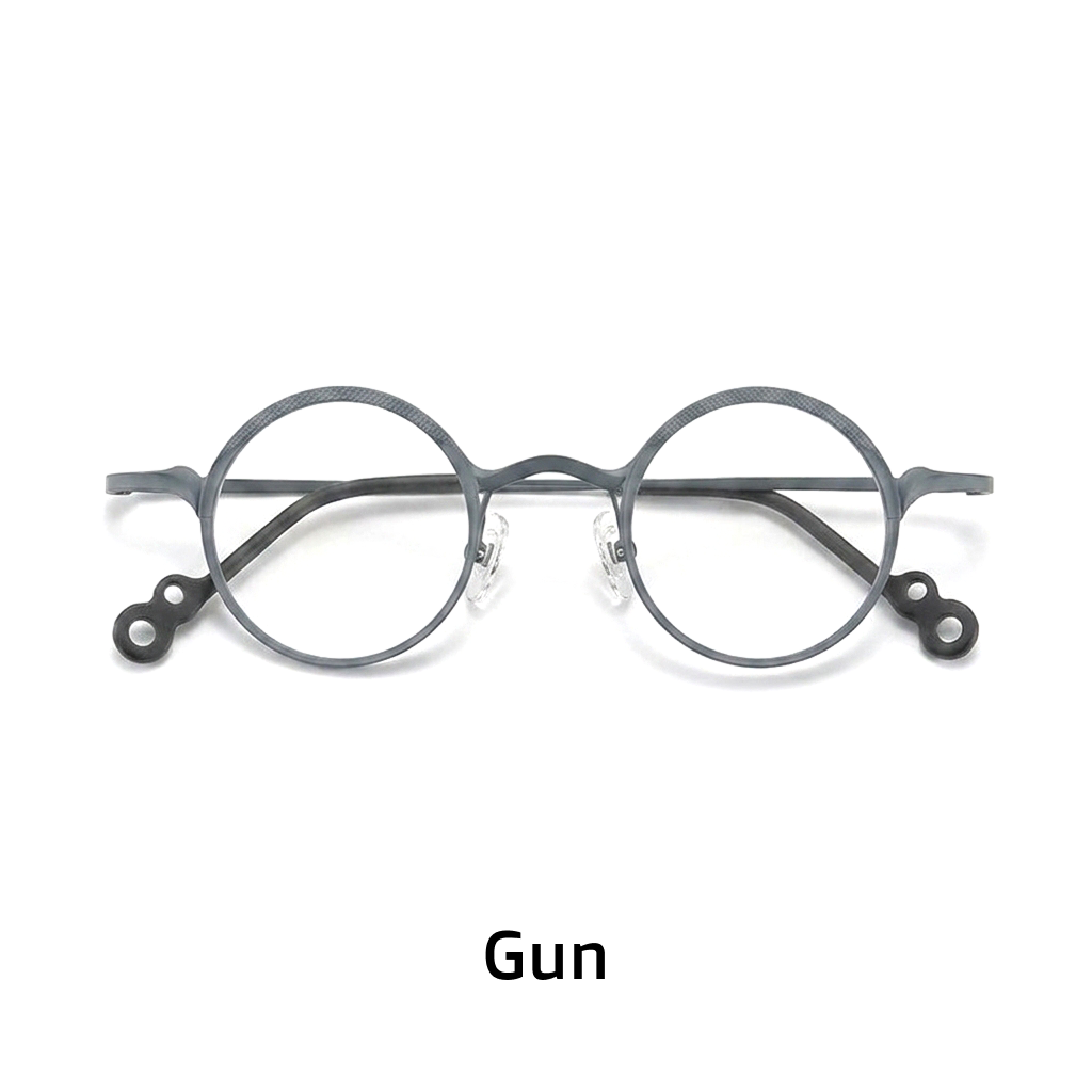 Lunettes rondes en pur titane ultra-léger, une pièce de créateur rétro tendance aux verres photochromiques artistiques.